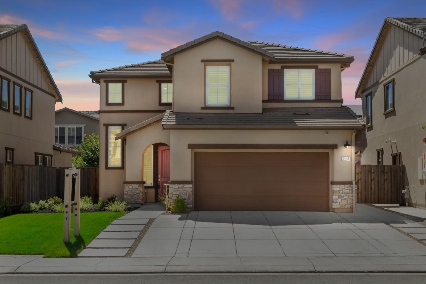 113 Willowrun Way Oakley, CA 94561 - Photo 63 of 63 a front view of a house with a yard and garage