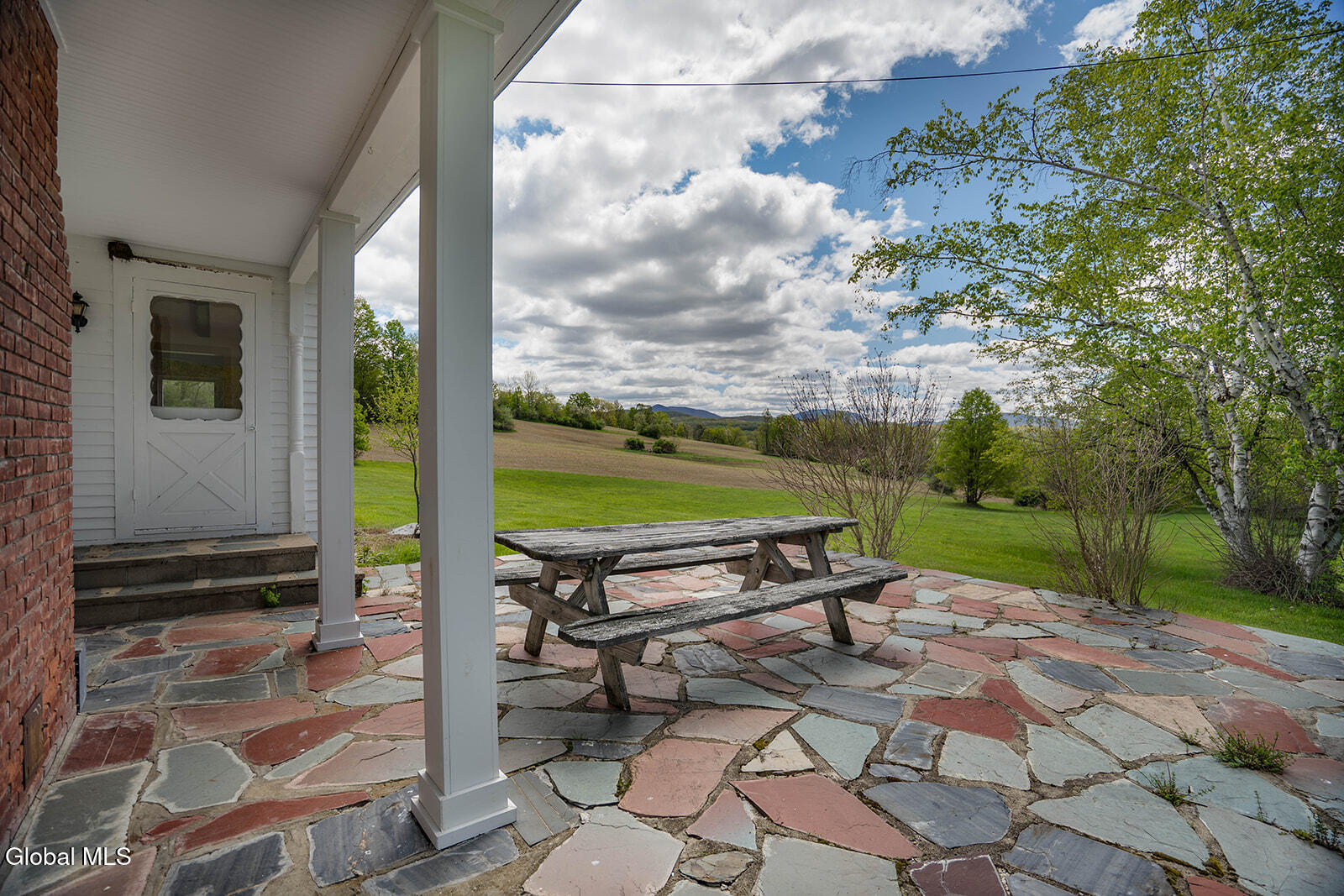 234 South Grimes Hill Road Hebron, NY 12832 - Photo 11 of 67 Side Porch & Slate Patio
