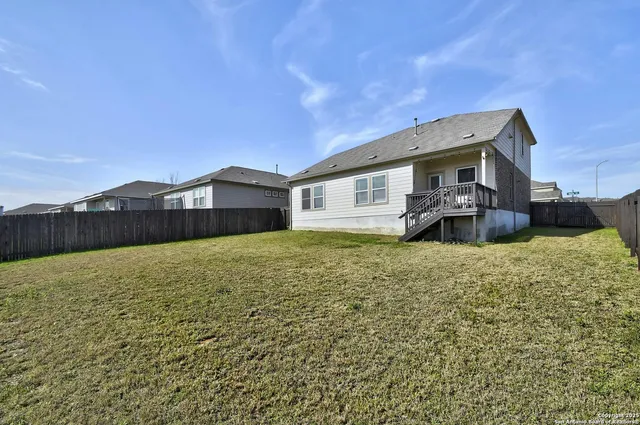 a house view with a garden space