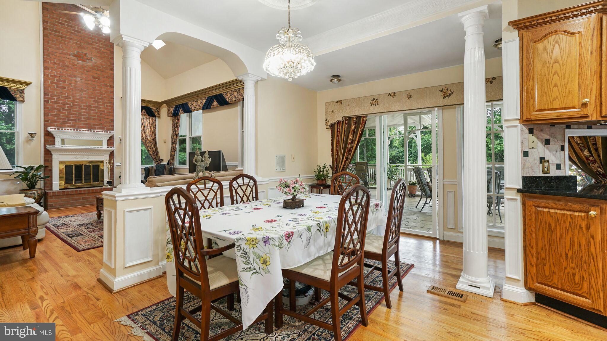 730 McNeil Lane Silver Spring, MD 20905 - Photo 5 of 30 Kitchen/Breakfast area leads to expansive deck