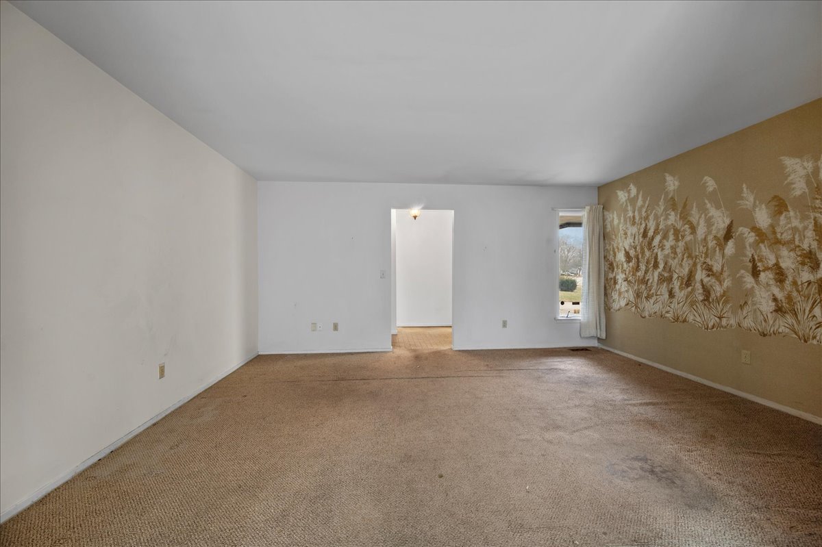 30 Somerset Road Montgomery, IL 60538 - Photo 5 of 30 a view of an empty room with a window