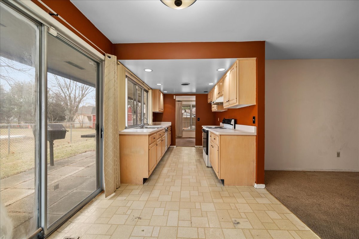 30 Somerset Road Montgomery, IL 60538 - Photo 8 of 30 a view of a kitchen with a refrigerator and a stove
