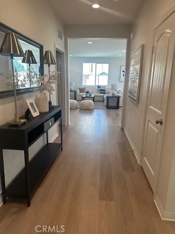 a view of a living room and dining room