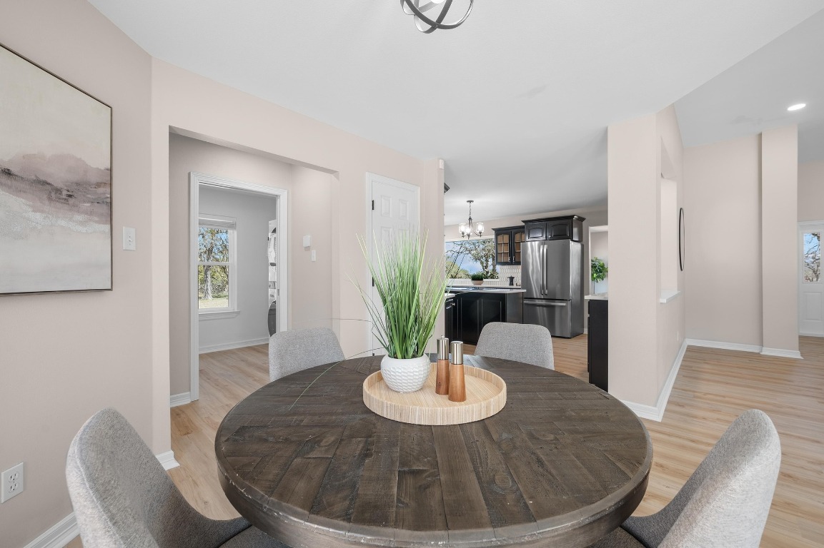 201 Young Ranch Road Georgetown, TX 78633 - Photo 14 of 40 a view of a dining room with furniture