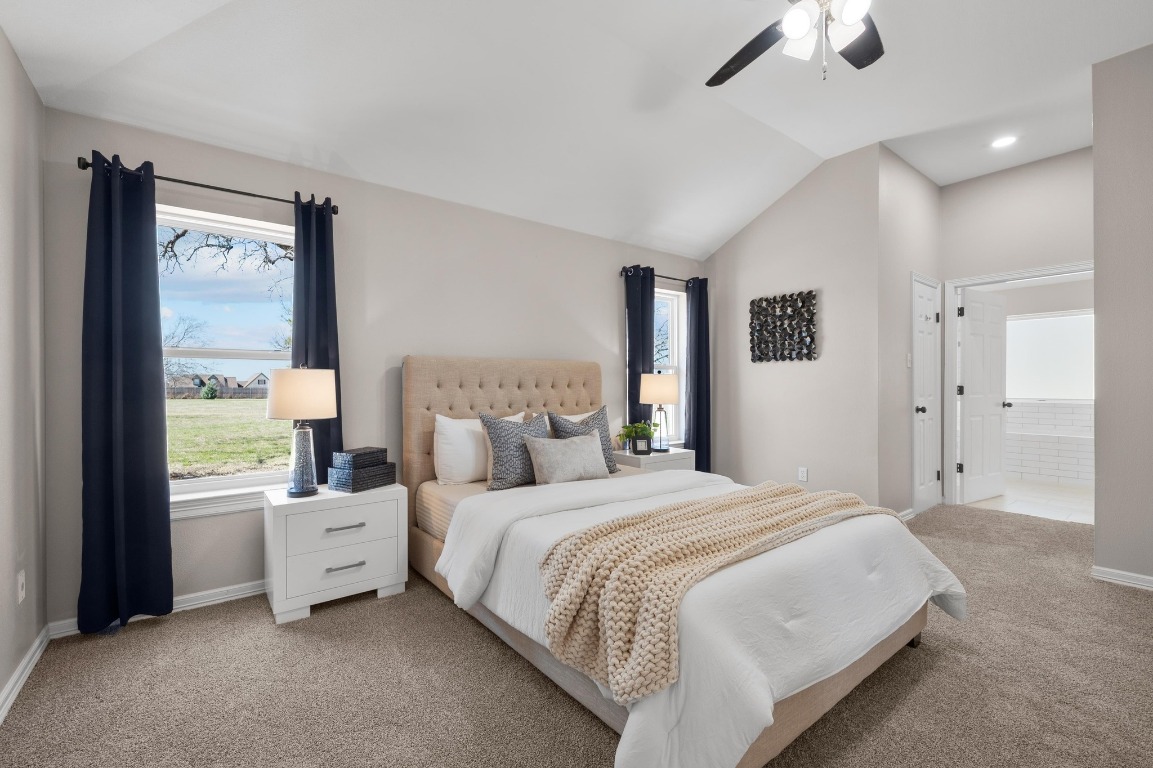 201 Young Ranch Road Georgetown, TX 78633 - Photo 16 of 40 a bedroom with a bed and a large window