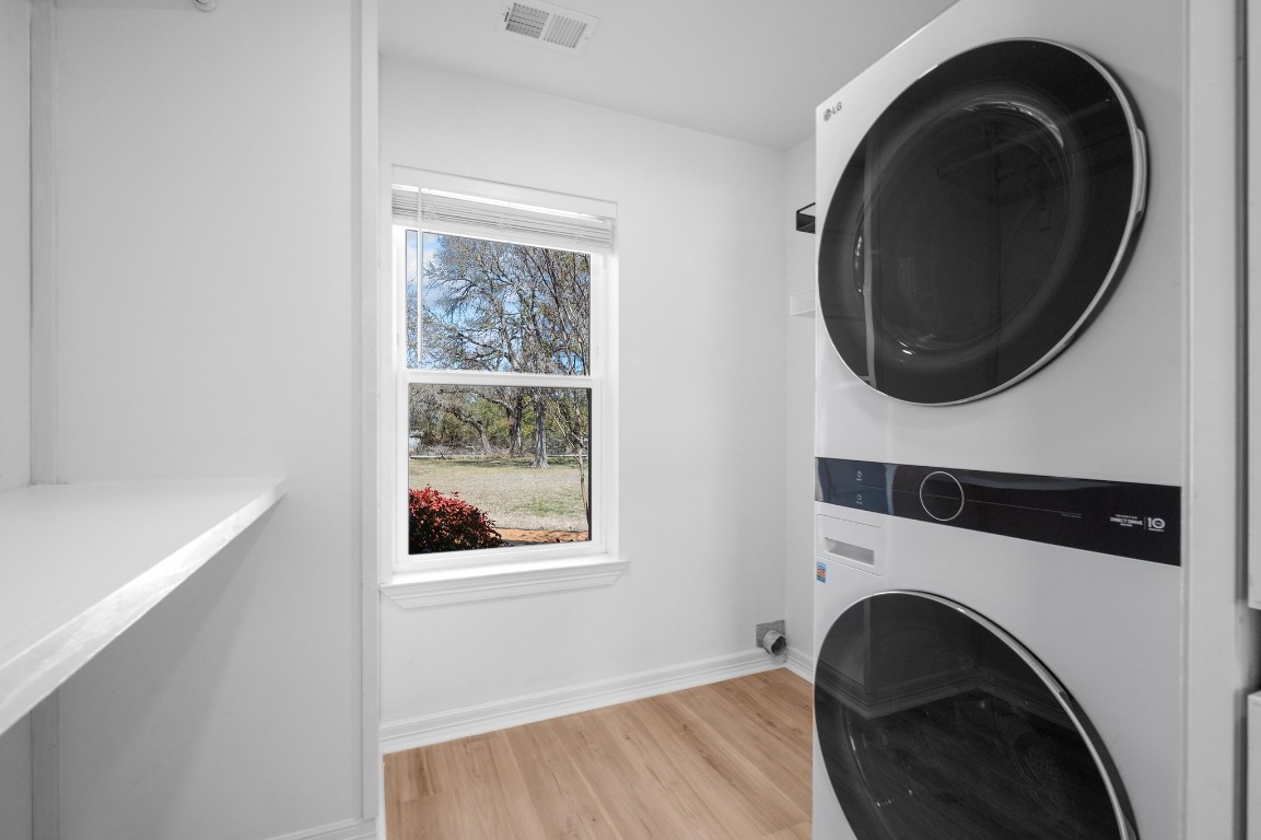 201 Young Ranch Road Georgetown, TX 78633 - Photo 25 of 40 a view of a bedroom with washer and dryer