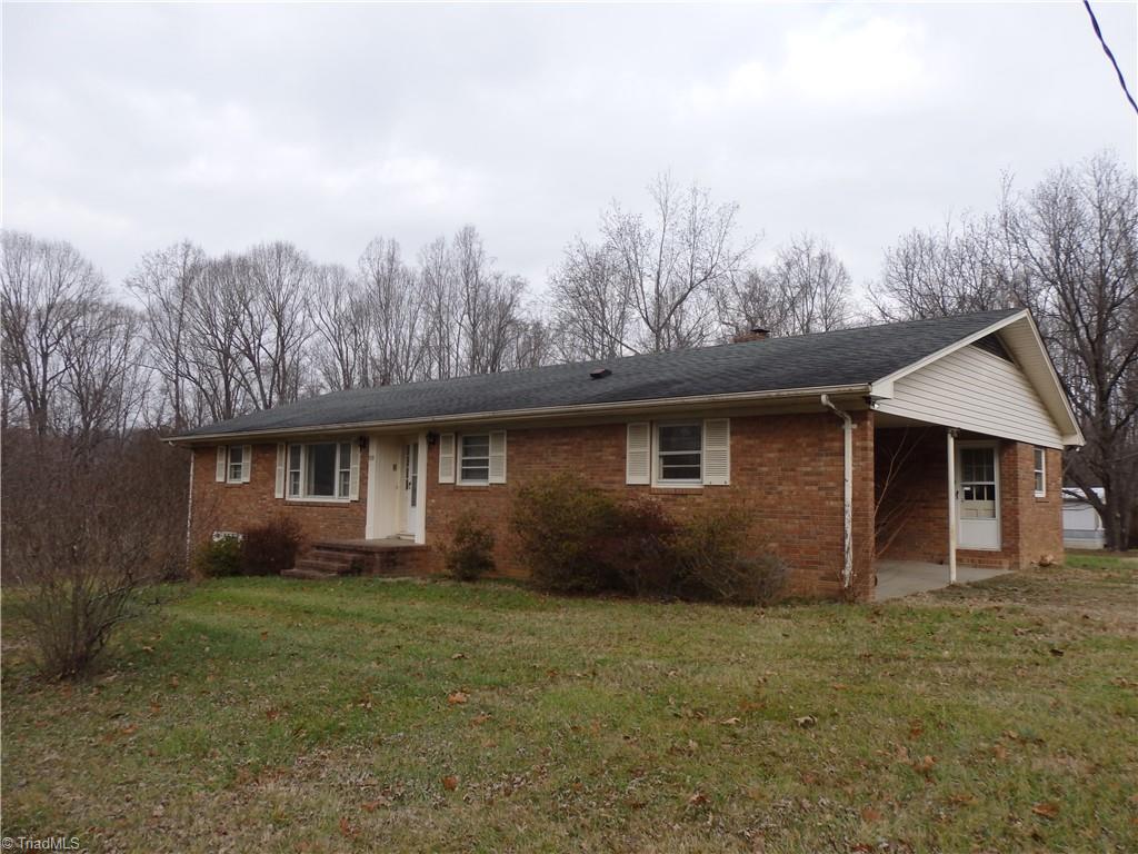 1018 Sutton Road Greensboro, NC 27406 - Photo 1 of 47 Front of home with double carport