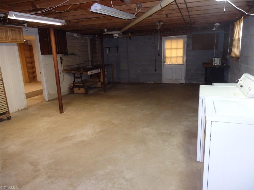 1018 Sutton Road Greensboro, NC 27406 - Photo 25 of 47 Basement with washer/dryer hook ups.