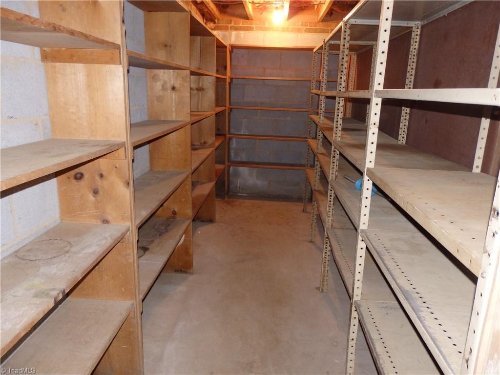 1018 Sutton Road Greensboro, NC 27406 - Photo 29 of 47 Shelves in basement