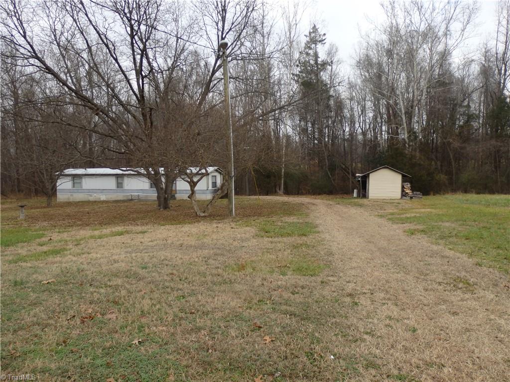 1018 Sutton Road Greensboro, NC 27406 - Photo 31 of 47 Mobile home behind house.