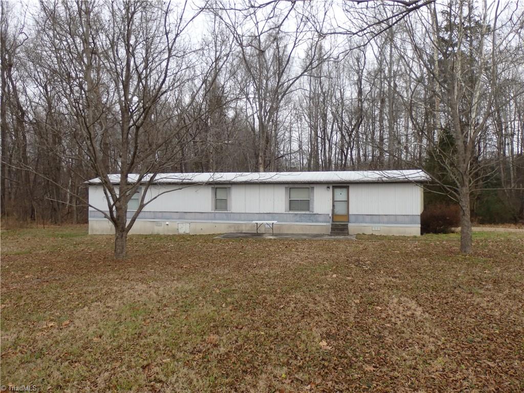 1018 Sutton Road Greensboro, NC 27406 - Photo 32 of 47 Mobile home behind house.