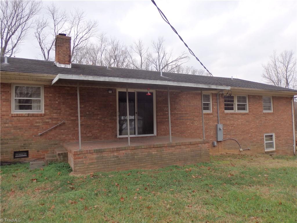 1018 Sutton Road Greensboro, NC 27406 - Photo 5 of 47 Covered brick porch.