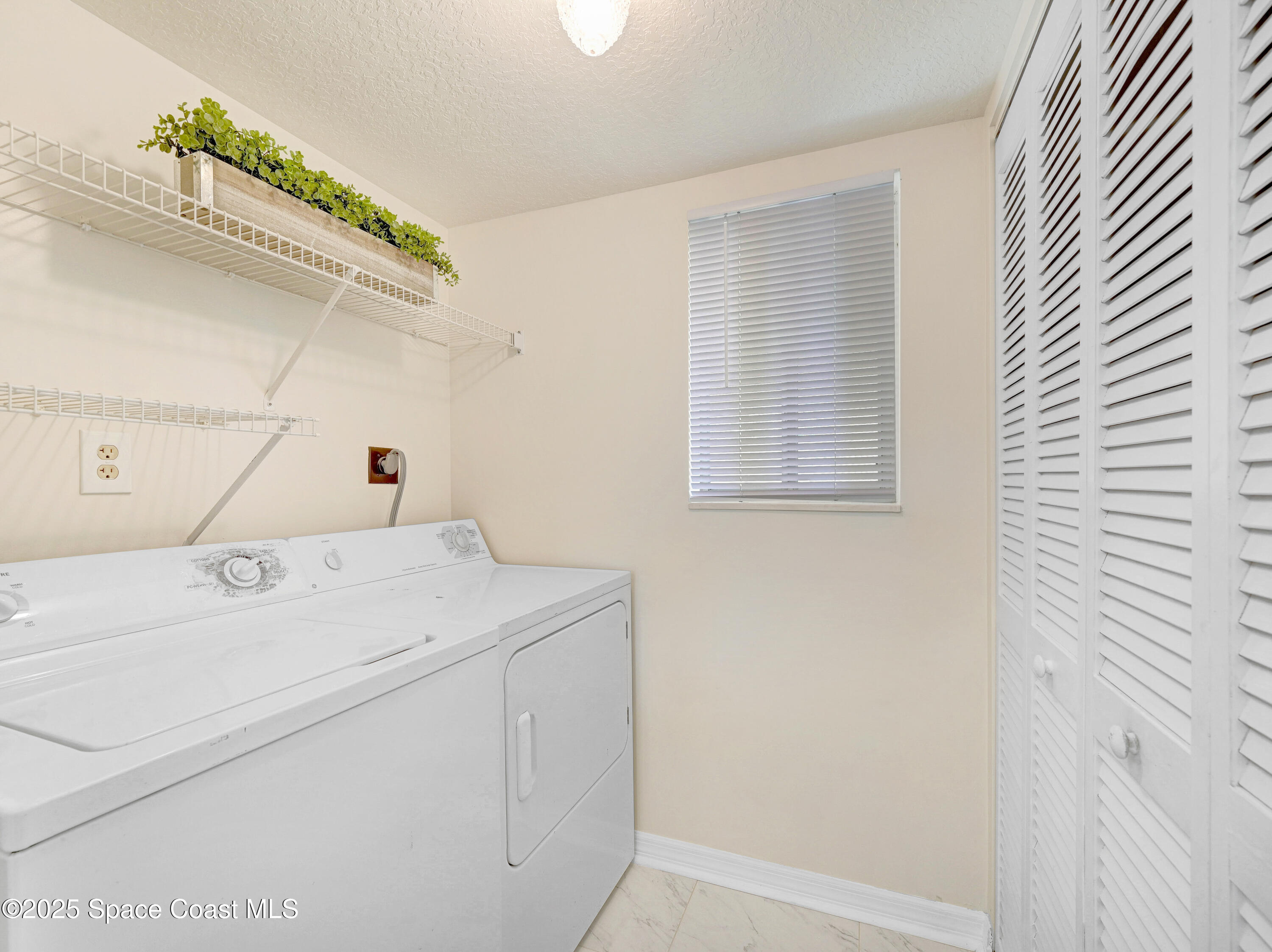 1410 Huntington Lane, Unit 1203 Rockledge, FL 32955 - Photo 20 of 46 Laundry