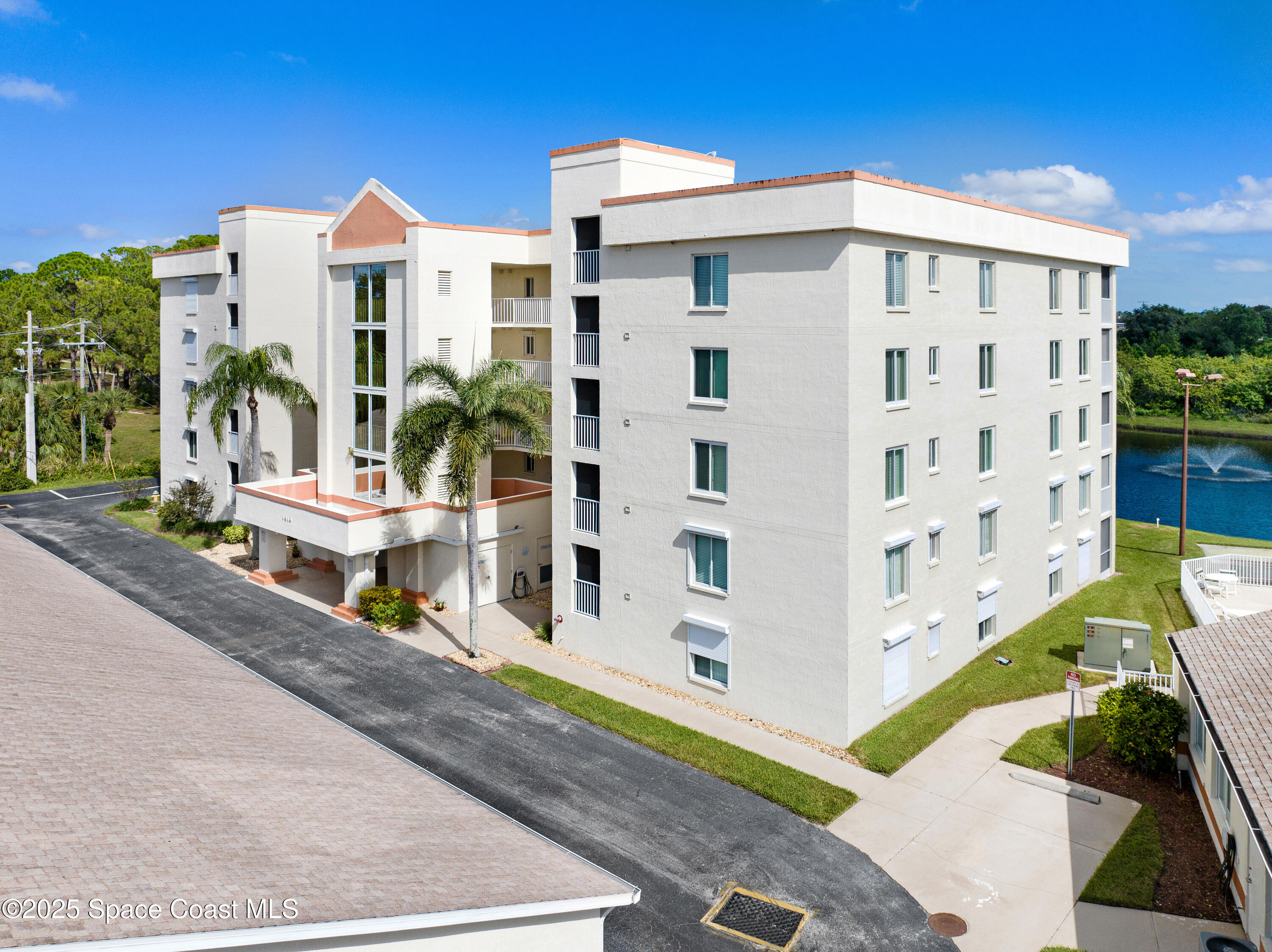 1410 Huntington Lane, Unit 1203 Rockledge, FL 32955 - Photo 38 of 46 Exterior Front Building