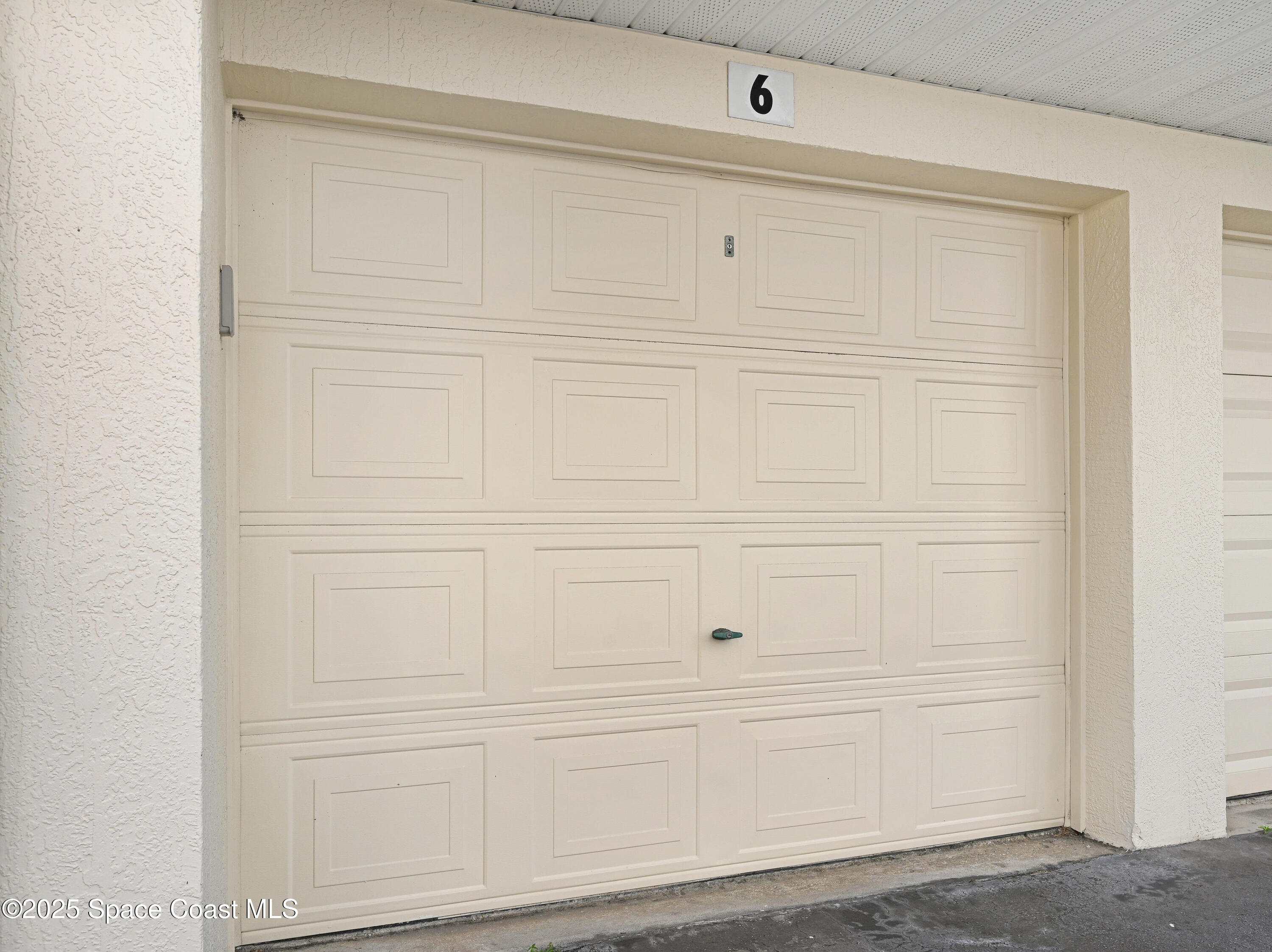 1410 Huntington Lane, Unit 1203 Rockledge, FL 32955 - Photo 42 of 46 Garage Across From Main Lobby