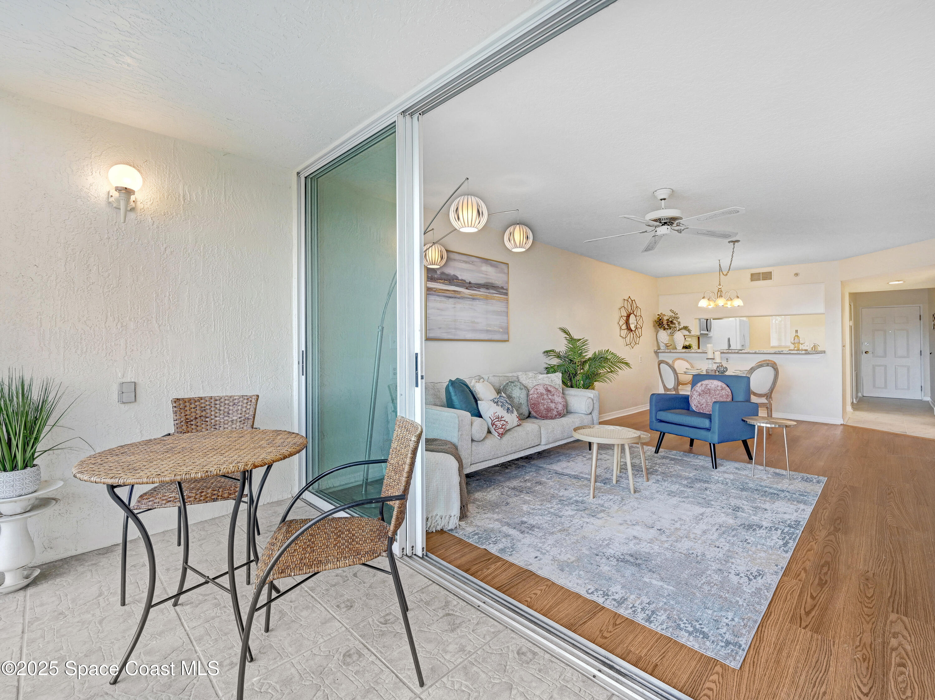 1410 Huntington Lane, Unit 1203 Rockledge, FL 32955 - Photo 10 of 46 Great Room from Enclosed Porch