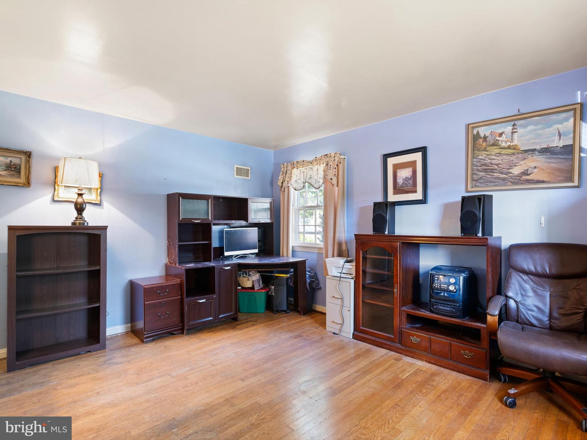 133 Marcella Road Wilmington, DE 19803 - Photo 20 of 27 a living room with furniture and a flat screen tv