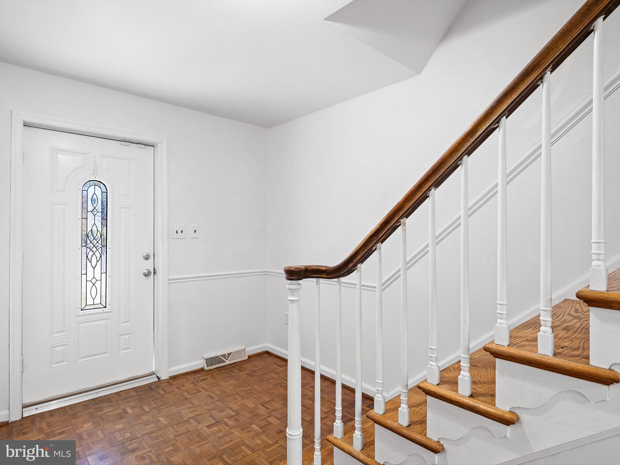 133 Marcella Road Wilmington, DE 19803 - Photo 3 of 27 a view of staircase with railing and white walls