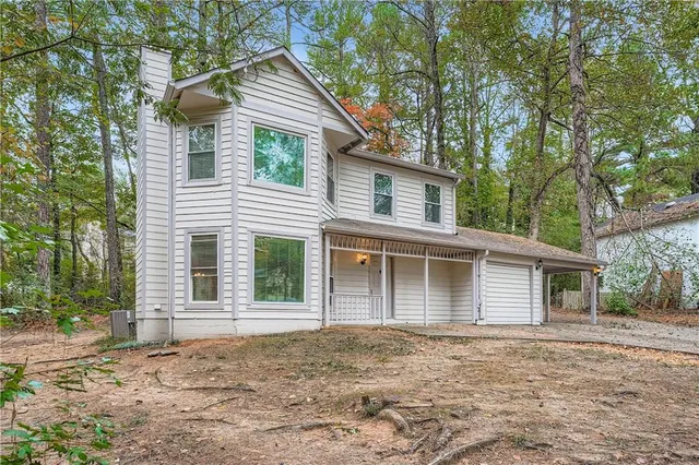front view of a house with a trees