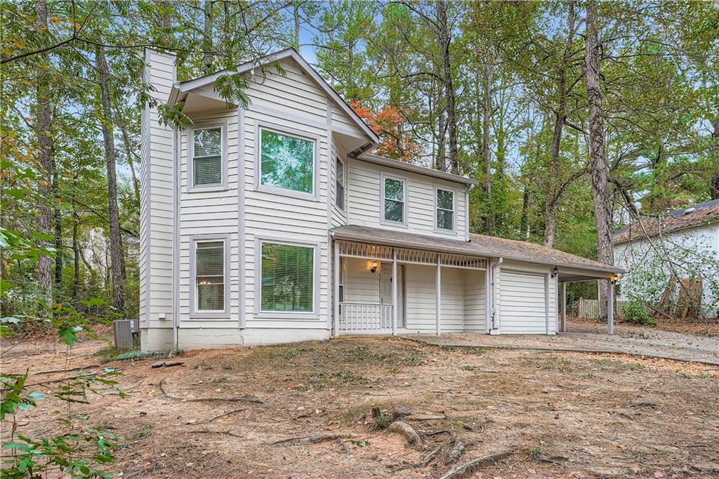 front view of a house with a trees