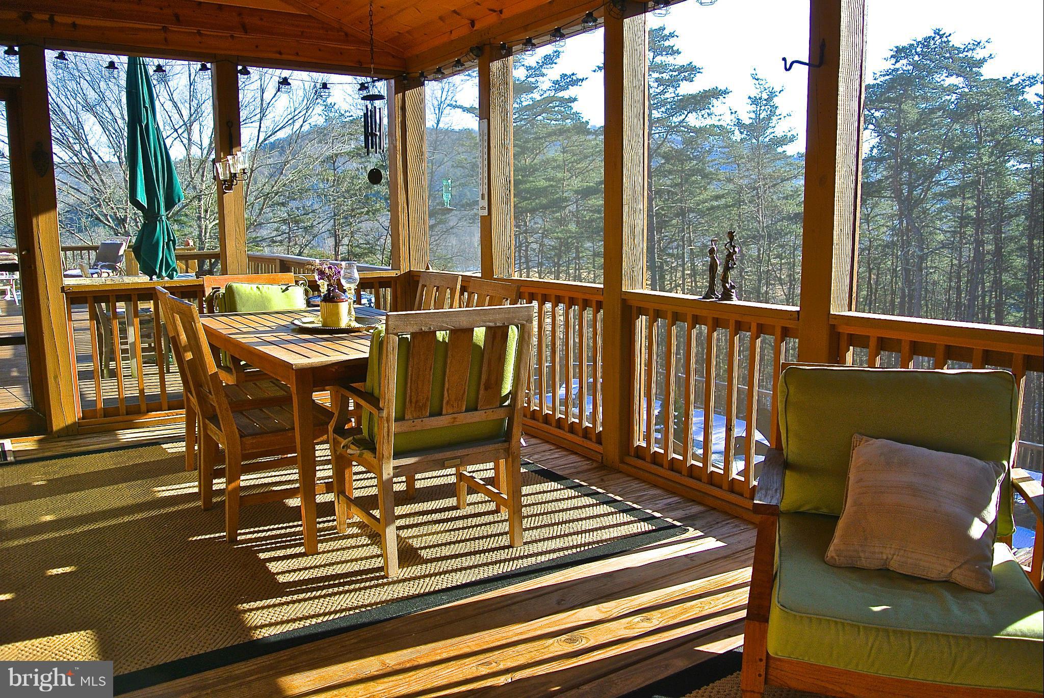140 Baker Rdg Road Baker, WV 26801 - Photo 7 of 30 Main Floor Screened Dining Porch