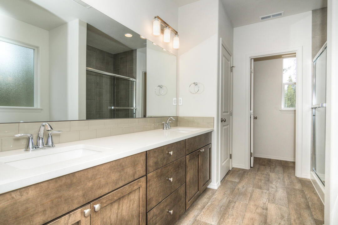 17084 Indio Road Bend, OR 97707 - Photo 28 of 40 a bathroom with a sink and a mirror