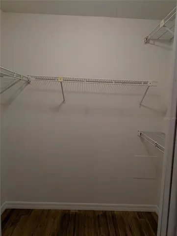 a view of small space with racks on the wall