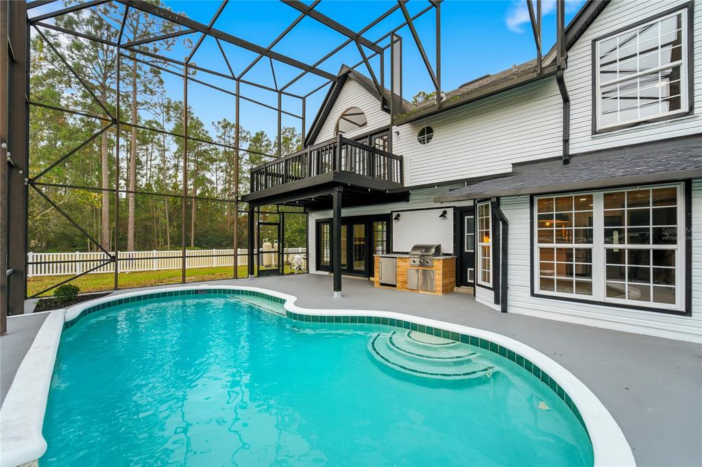 14728 Henson Road Orlando, FL 32832 - Photo 70 of 79 a view of a house with swimming pool and sitting area