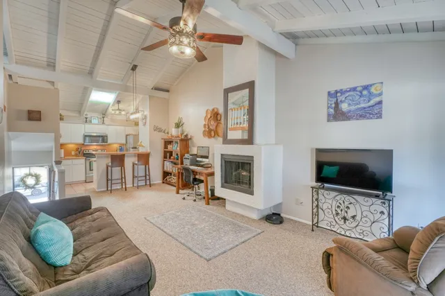 a kitchen with a sink and a stove top oven