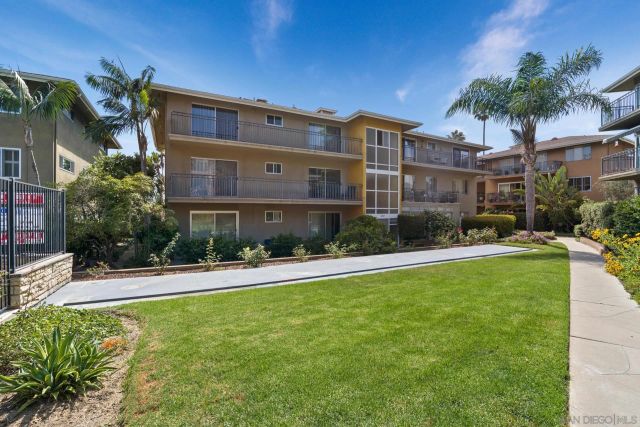 a view of a building with a street