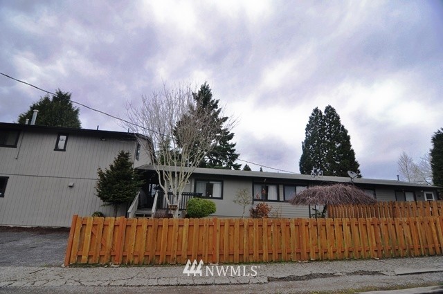 660 Index Place Northeast Renton, WA 98056 - Photo 4 of 18 a view of a house with wooden floor