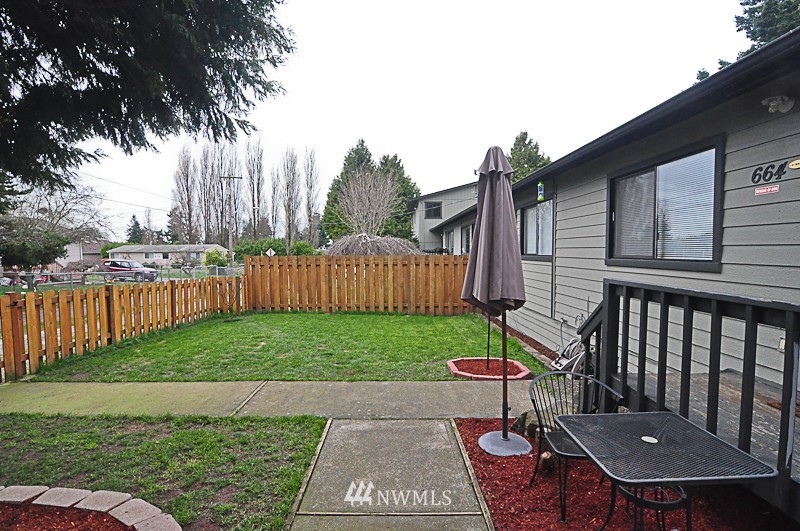 660 Index Place Northeast Renton, WA 98056 - Photo 5 of 18 a view of a backyard with a garden