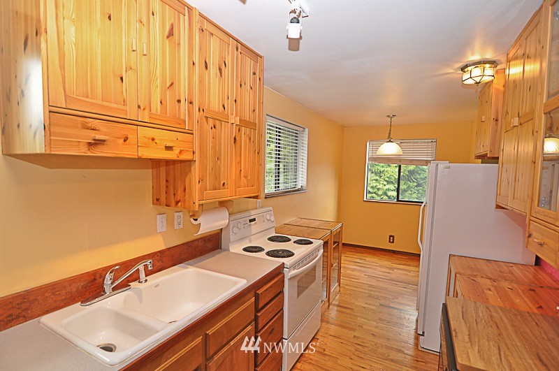 660 Index Place Northeast Renton, WA 98056 - Photo 6 of 18 a bathroom with a sink and a mirror