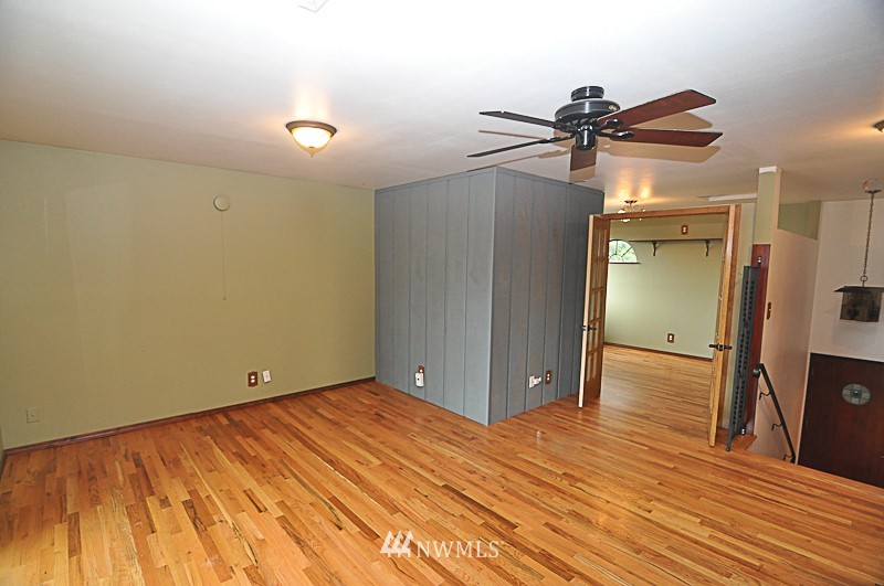 660 Index Place Northeast Renton, WA 98056 - Photo 9 of 18 a view of a room with wooden floor
