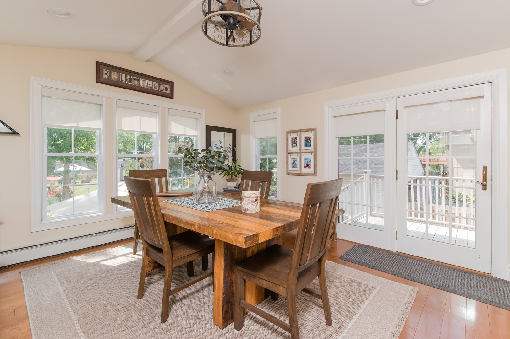 103 Oakleaf Road Lake In The Hills, IL 60156 - Photo 12 of 41 a view of a dining room with furniture window and wooden floor