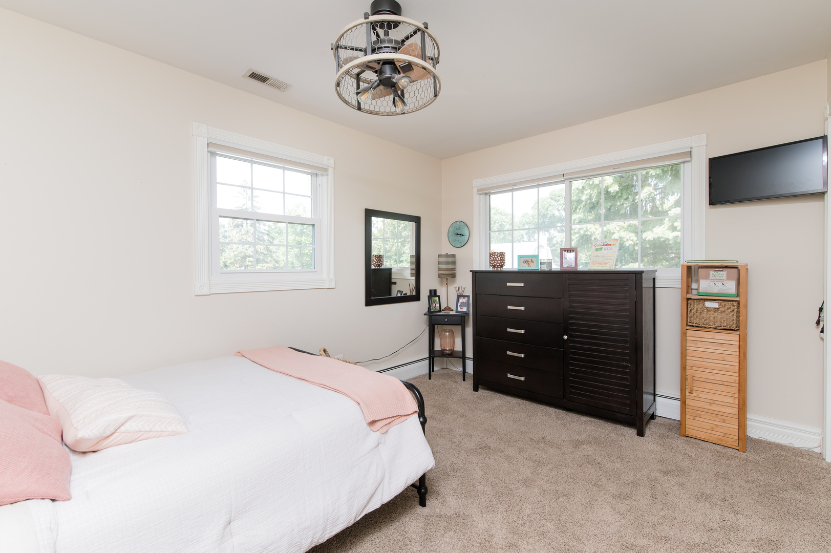 103 Oakleaf Road Lake In The Hills, IL 60156 - Photo 21 of 41 a bedroom with a bed and a dresser