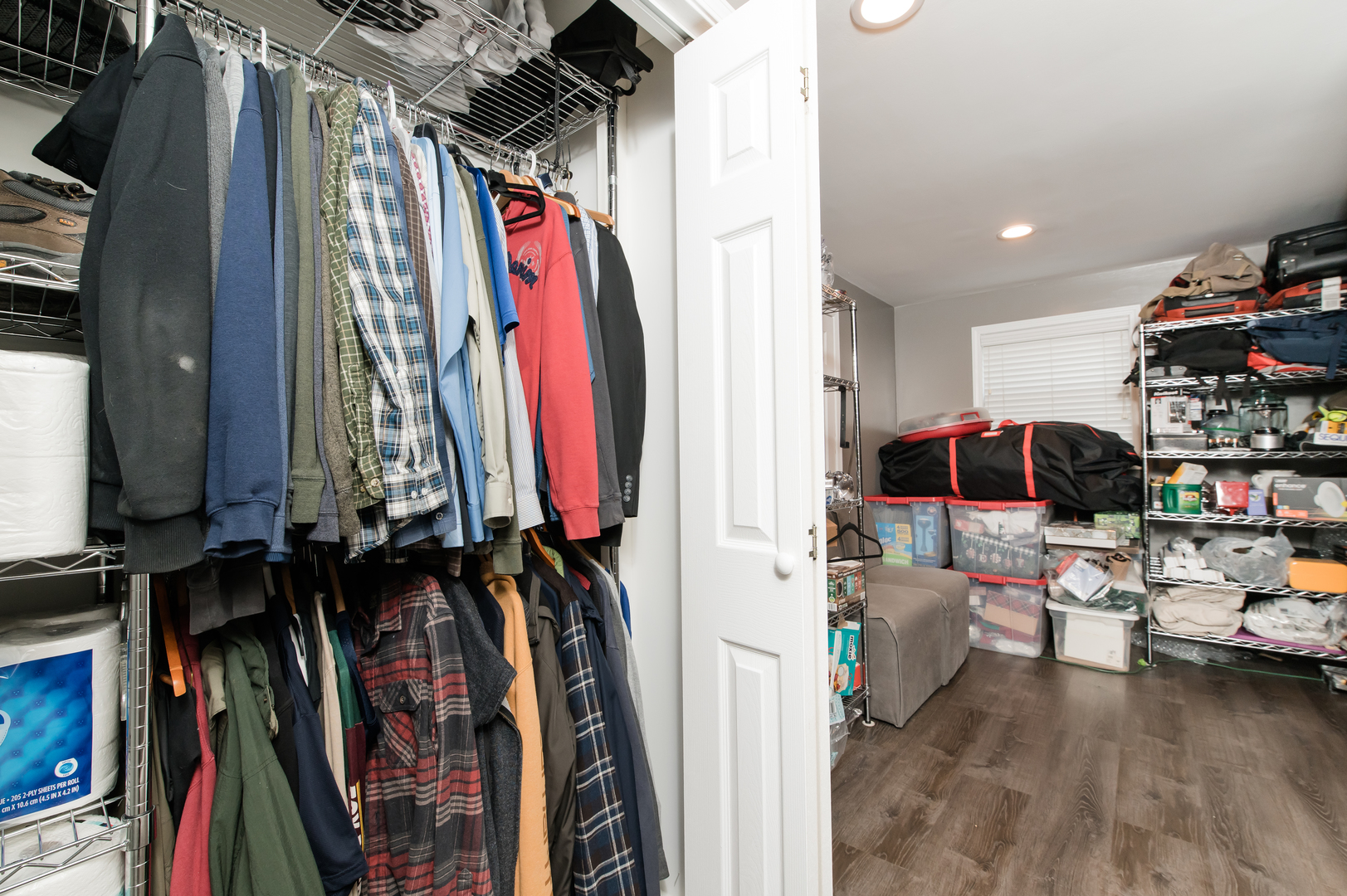 103 Oakleaf Road Lake In The Hills, IL 60156 - Photo 35 of 41 a view of walk in closet with clothes and shoes