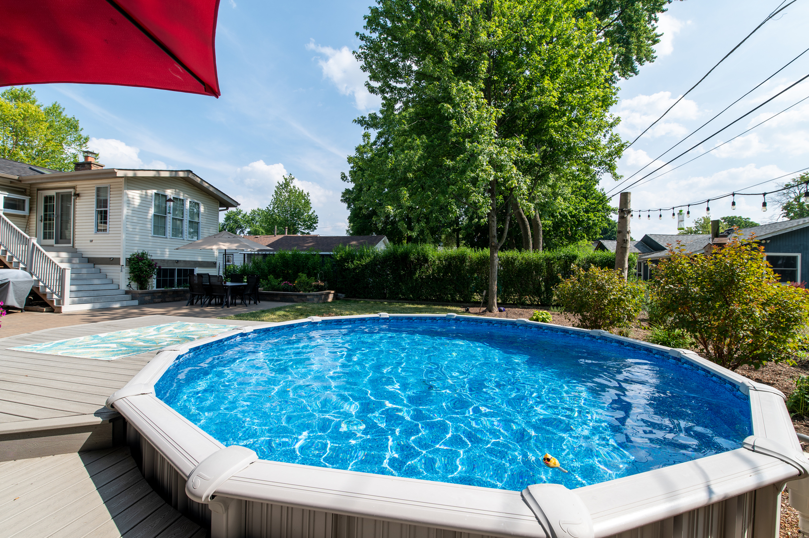 103 Oakleaf Road Lake In The Hills, IL 60156 - Photo 7 of 41 a view of a swimming pool with a patio