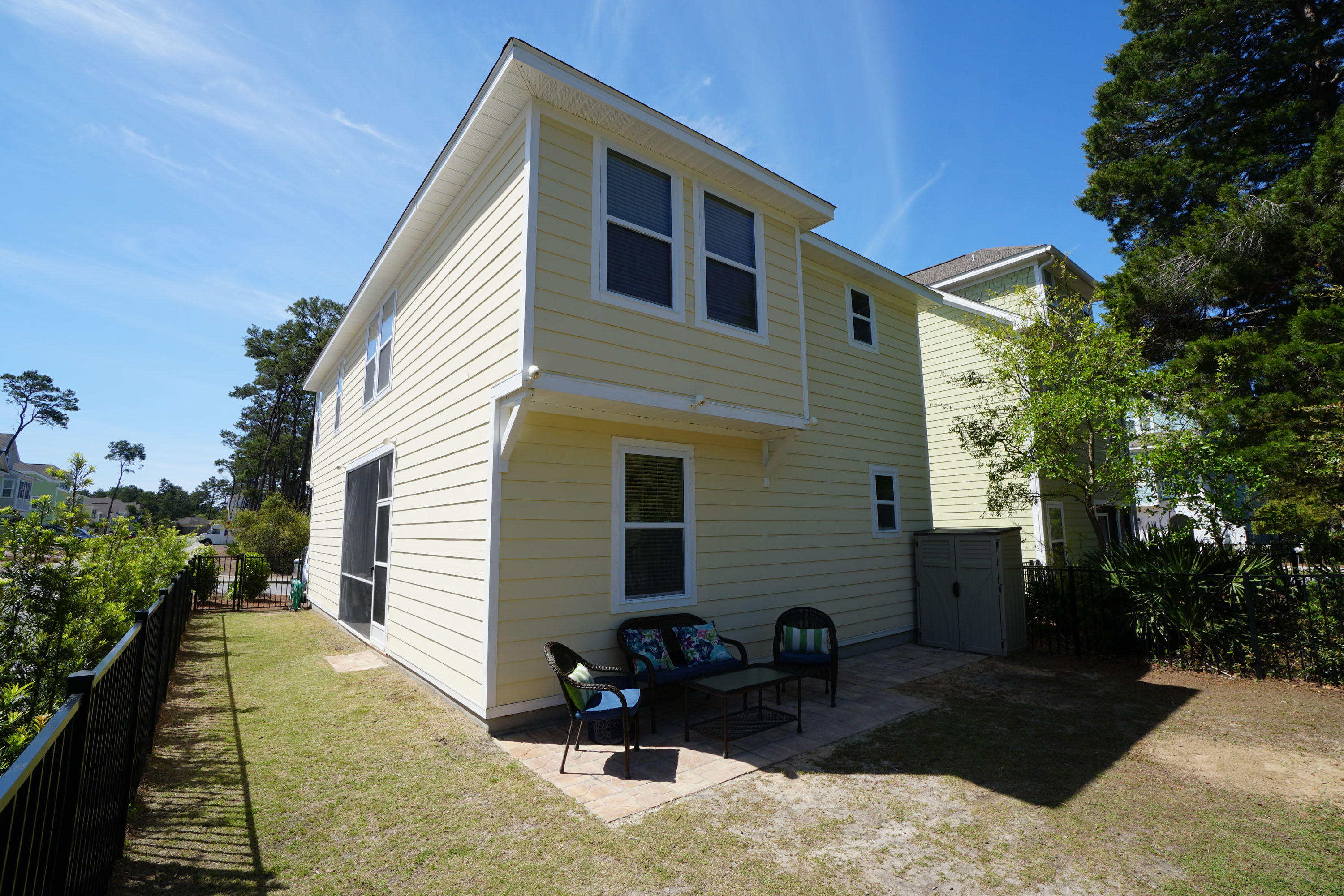 56 Sandpine Loop Inlet Beach, FL 32461 - Photo 19 of 22 a front view of a house with a yard