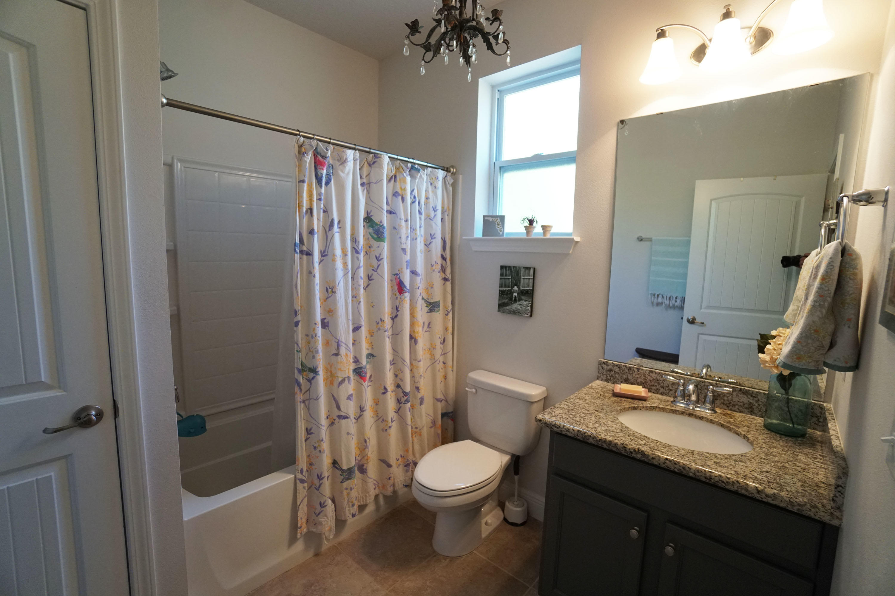 56 Sandpine Loop Inlet Beach, FL 32461 - Photo 10 of 22 a bathroom with a granite countertop sink toilet and shower
