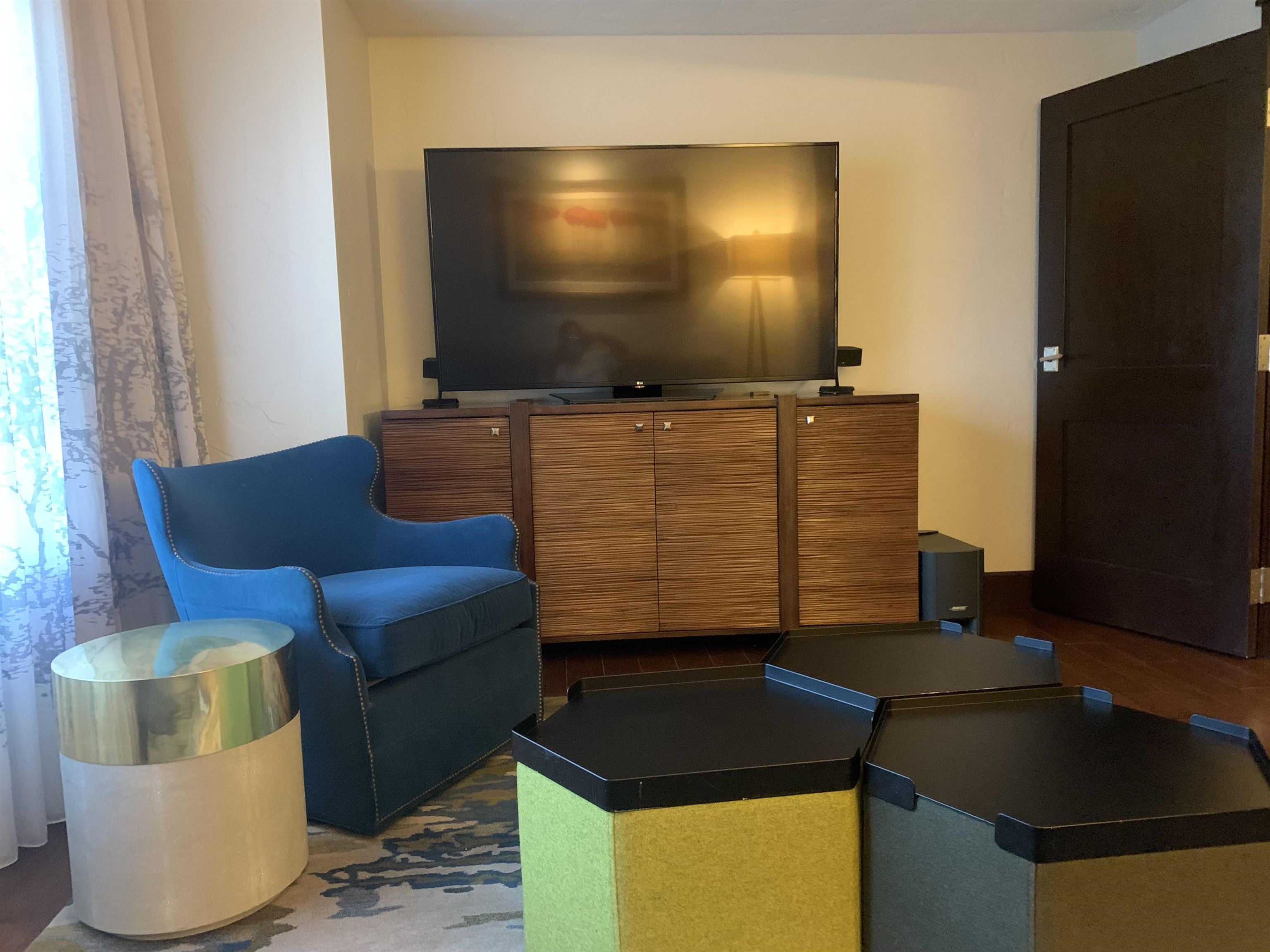 13051 Ritz Carlton Highlands Court, Unit 4304 INTEREST 3 Truckee, CA 96161 - Photo 7 of 12 a living room with furniture and a flat screen tv