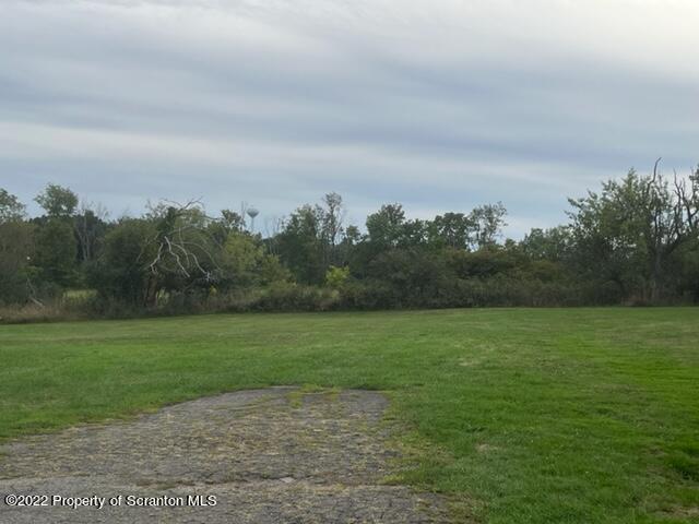 1308 Gravel Pond Road Clarks Summit, PA 18411 - Photo 18 of 18 a view of grassy field with trees