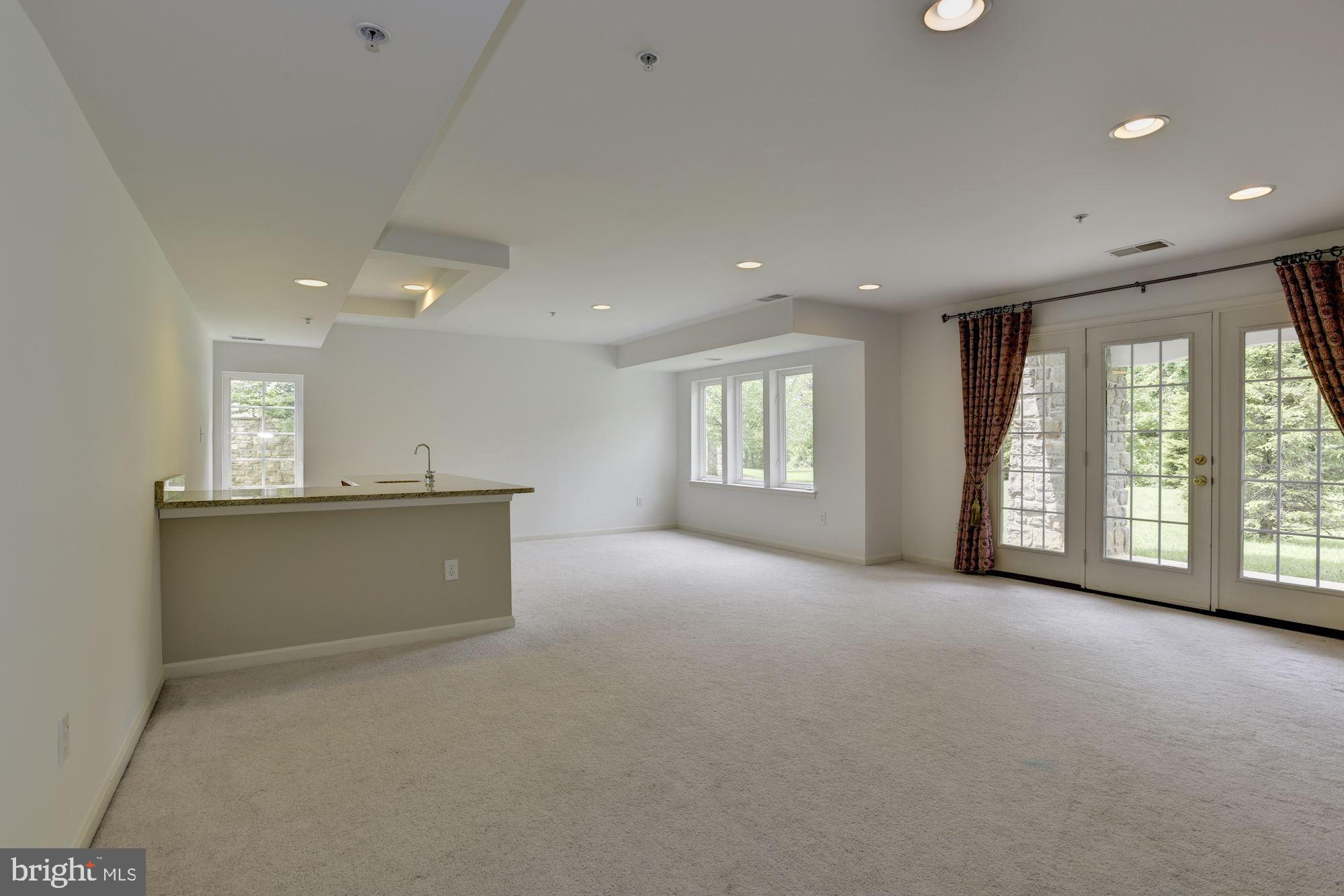 8761 Boulder Ridge Road Laurel, MD 20723 - Photo 26 of 44 Lower Level Family Room | Access to Patio