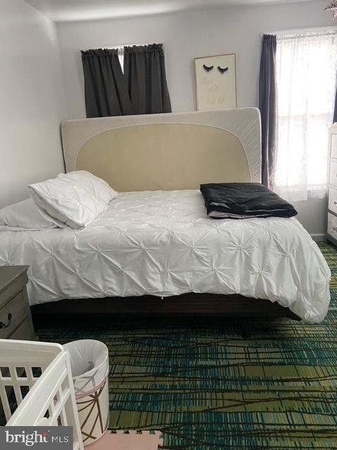 448 Hamilton Street Harrisburg, PA 17102 - Photo 3 of 12 a bedroom with a bed and a window