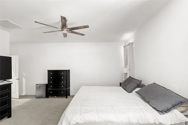 a bathroom with a double vanity sink mirror double and bathtub
