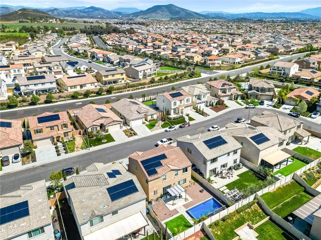 an aerial view of a city with lots of residential buildings