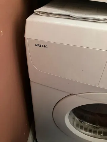 a close up view of washer and dryer