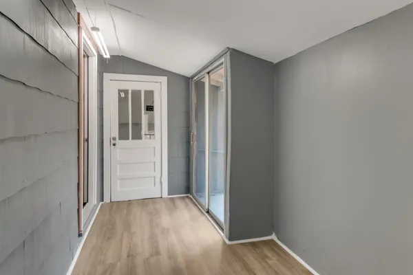 a view of a trees in front of a house