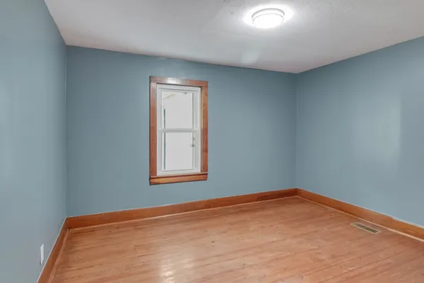 a view of a room that has a window in it