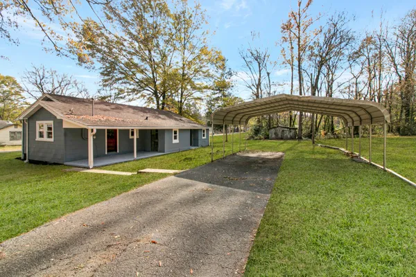 a view of outdoor space yard and front view of a house